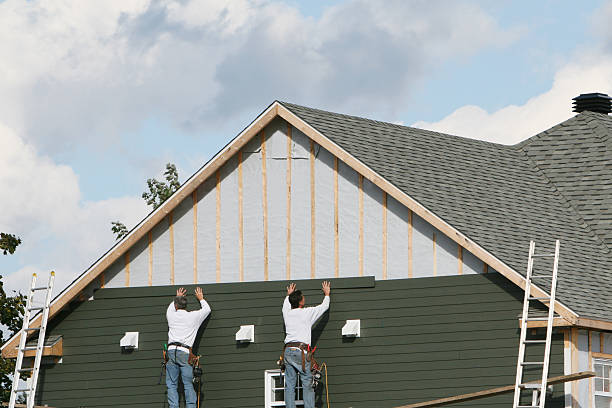Professional Siding technician working in Wellsville, PA
